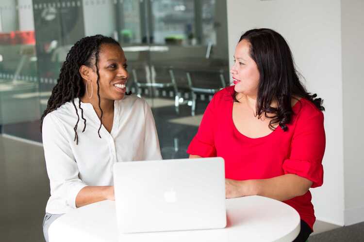 Canva Woman In Red Shirt Beside Woman In White Shirt (27 Sept 2019)