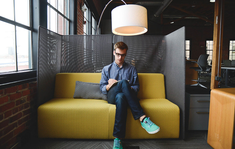 Canva Man Wearing Blue Dress Shirt Sitting On Yellow Sofa Blog