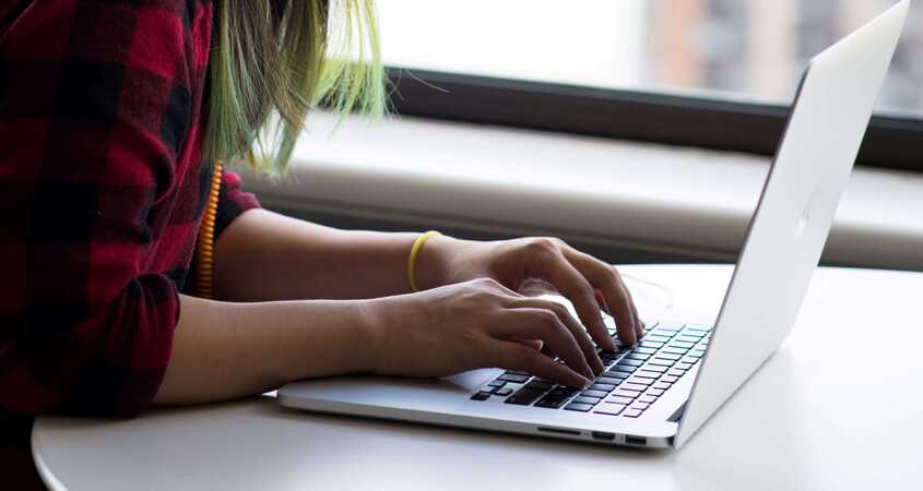 Canva Photography Of Woman Using Laptop (18 No 2019)
